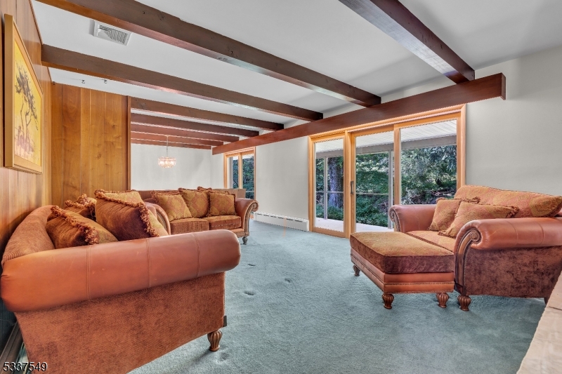 41 Cherryville Hollow Road Flemington, NJ 08822 - Photo 11 of 48 a living room with furniture and a large window