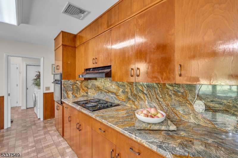 41 Cherryville Hollow Road Flemington, NJ 08822 - Photo 26 of 48 a bathroom with a granite countertop sink and a mirror