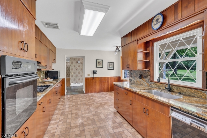 41 Cherryville Hollow Road Flemington, NJ 08822 - Photo 28 of 48 a large kitchen with stainless steel appliances granite countertop a lot of counter space and a sink
