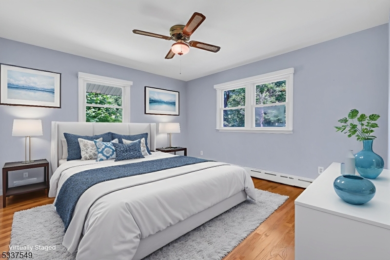 41 Cherryville Hollow Road Flemington, NJ 08822 - Photo 31 of 48 a bedroom with a bed and a potted plant