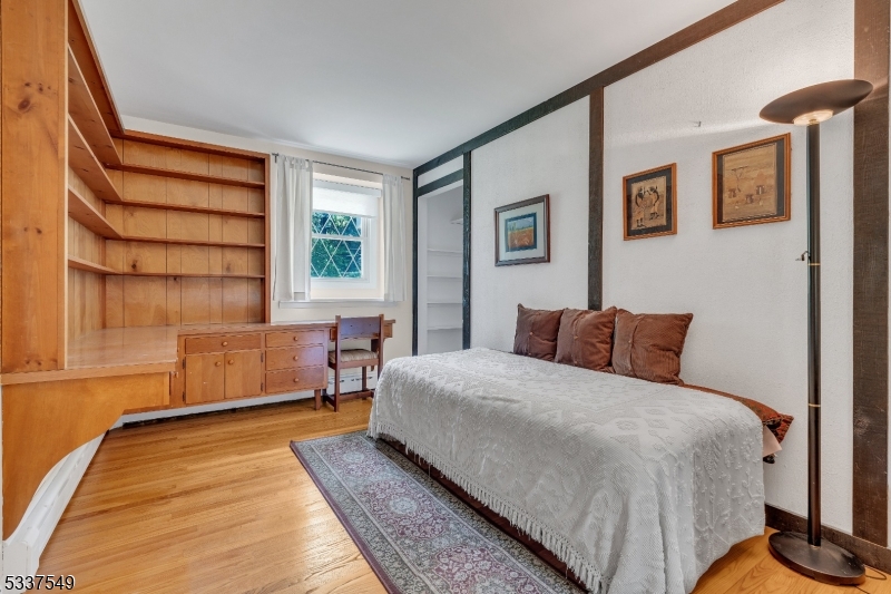 41 Cherryville Hollow Road Flemington, NJ 08822 - Photo 36 of 48 a bedroom with a bed and wooden floor