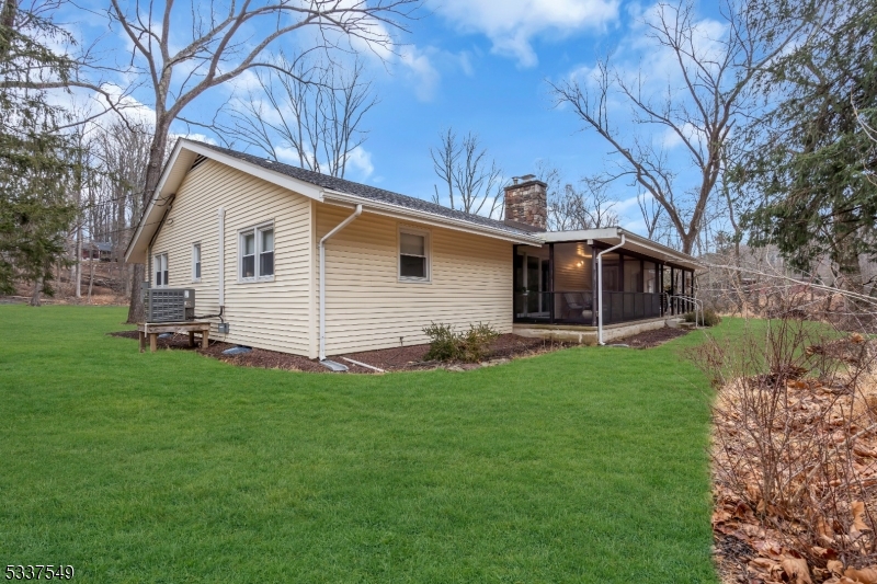 41 Cherryville Hollow Road Flemington, NJ 08822 - Photo 42 of 48 a front view of house with yard and green space