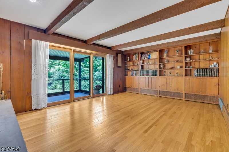 41 Cherryville Hollow Road Flemington, NJ 08822 - Photo 7 of 48 a view of an empty room with wooden floor and a window
