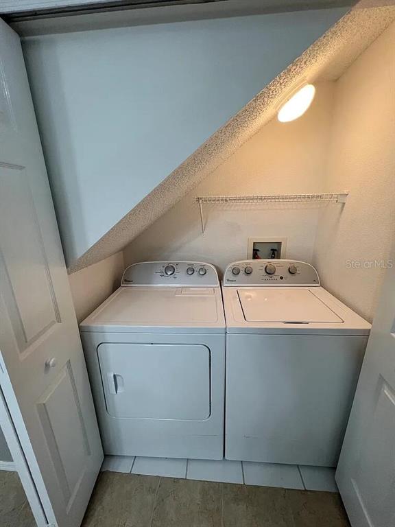 8674 Hunters Key Circle Tampa, FL 33647 - Photo 8 of 16 a utility room with dryer and washer