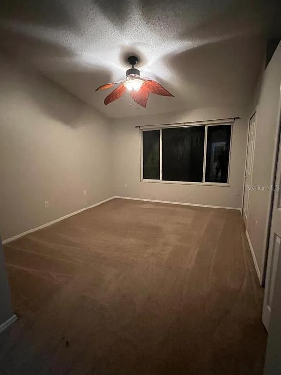 8674 Hunters Key Circle Tampa, FL 33647 - Photo 10 of 16 a view of an empty room with a window