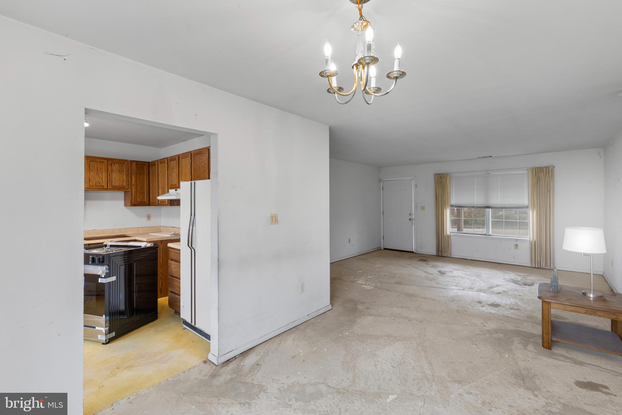 6231 Marlora Road Baltimore, MD 21239 - Photo 6 of 27 Living Room and Dining Area