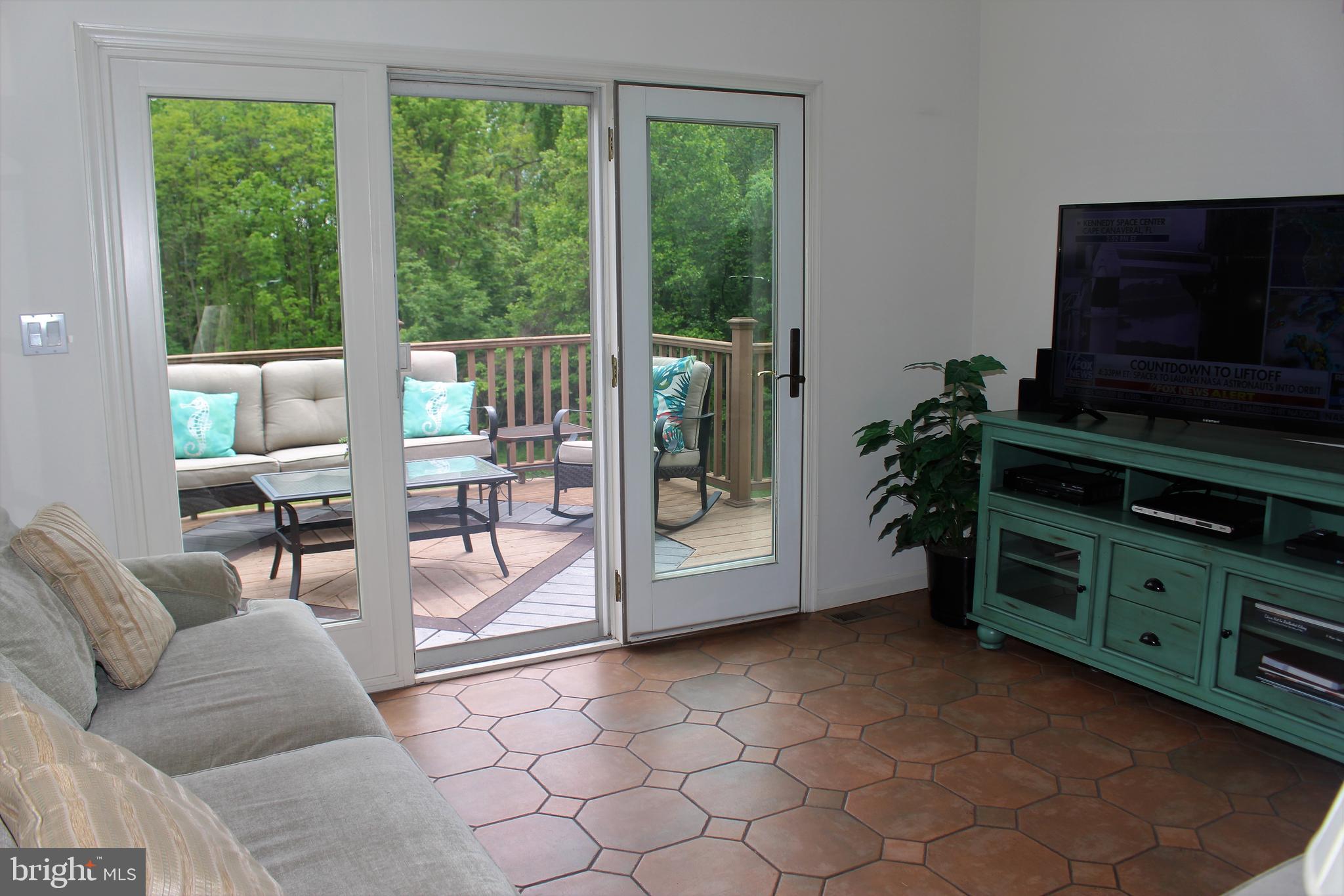 256 Willis Road Etters, PA 17319 - Photo 12 of 52 Great room view 5 entrance to deck