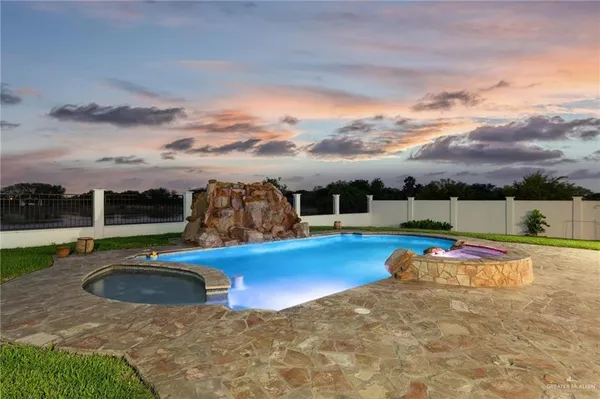 a view of a lake with a car parked