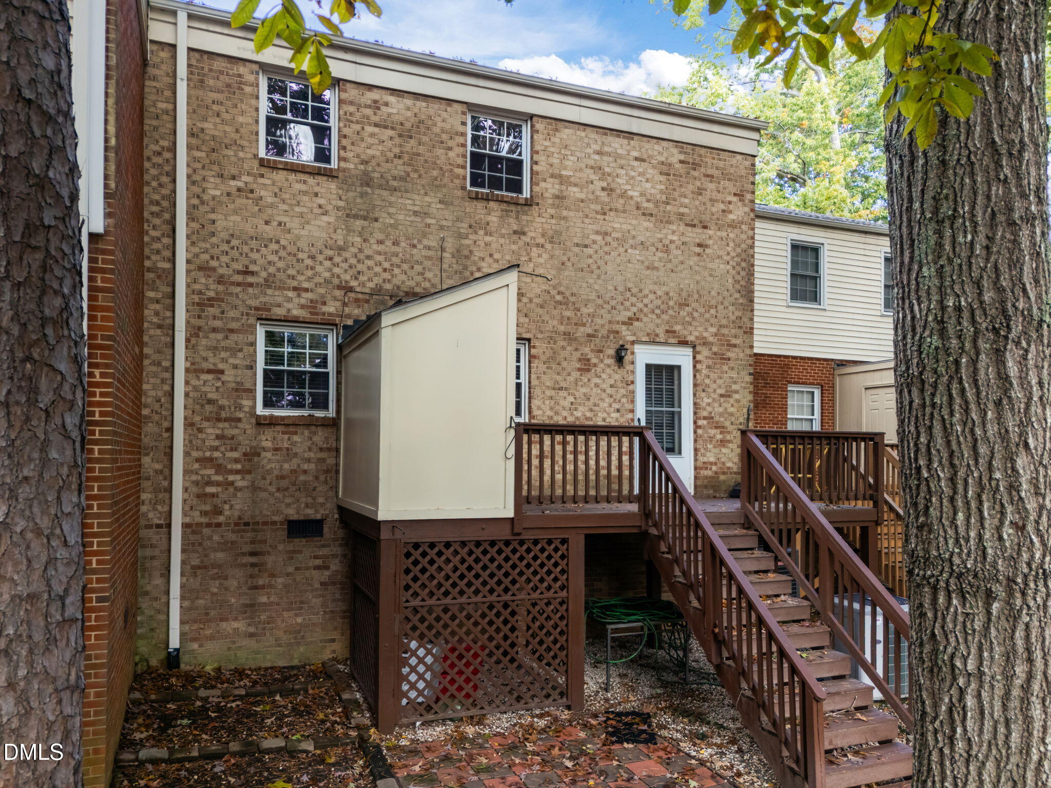 6423 New Market Way Raleigh, NC 27615 - Photo 28 of 33 a view of a house with backyard and deck