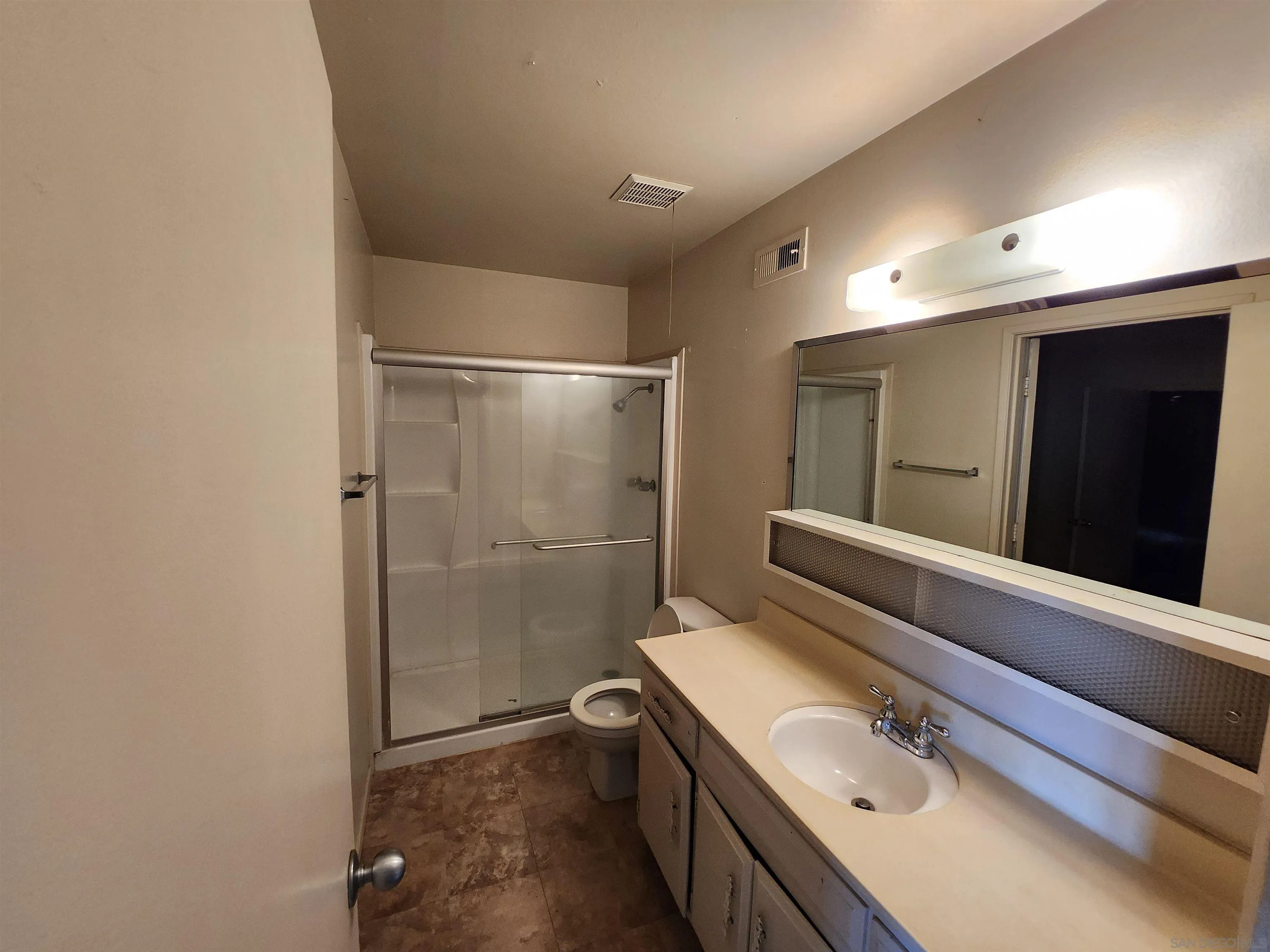2017 Crofton Street Spring Valley, CA 91977 - Photo 11 of 13 a bathroom with a sink and mirror