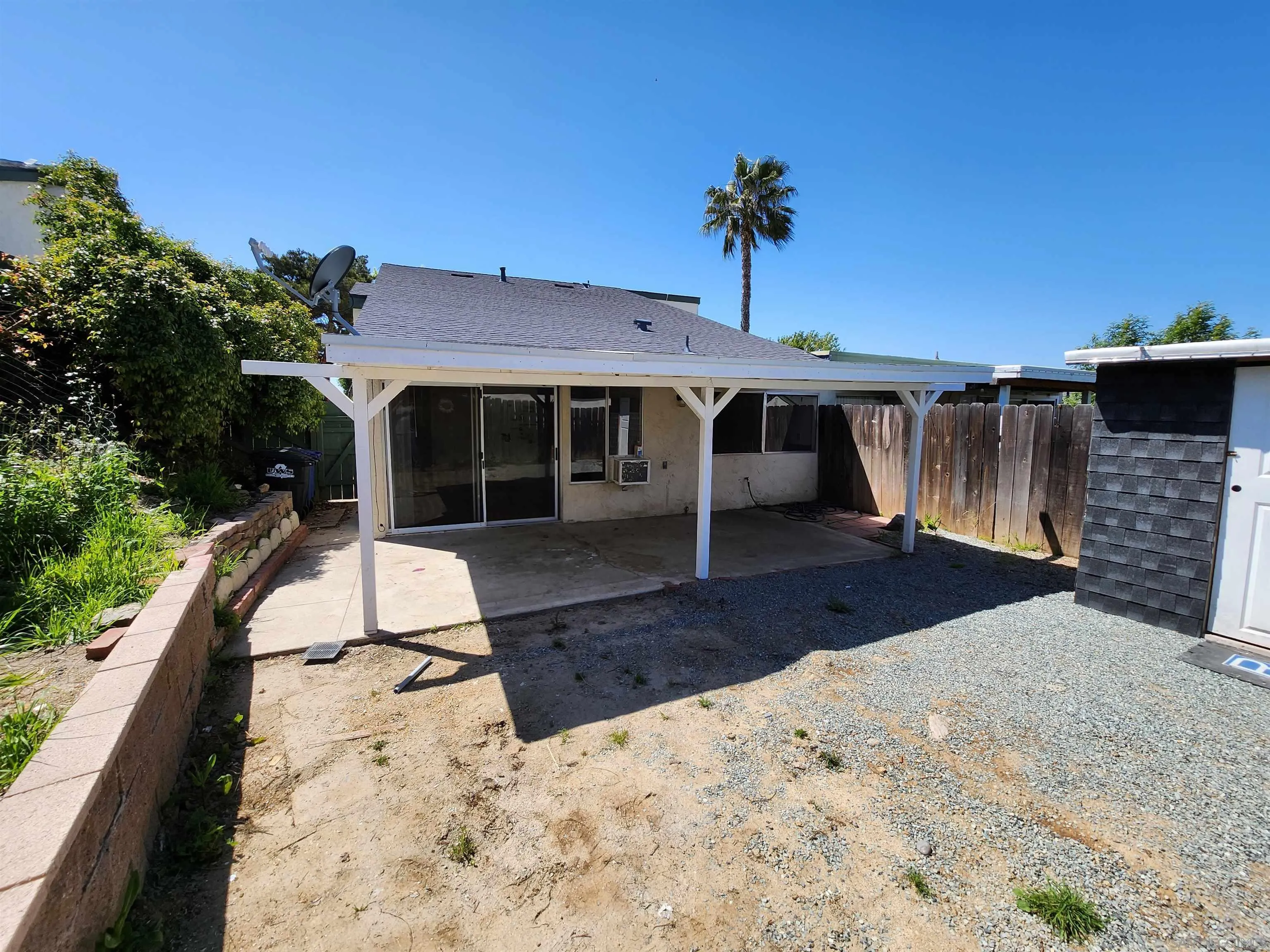 2017 Crofton Street Spring Valley, CA 91977 - Photo 4 of 13 a front view of a house with a yard