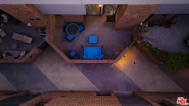 a picture of a room with a ceiling fan