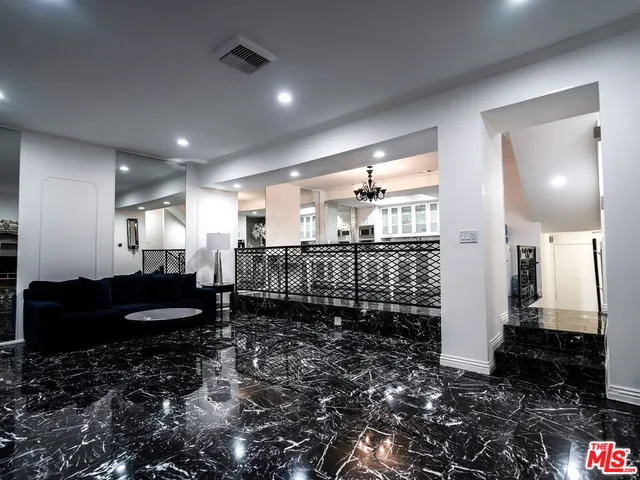 a bathroom with a large mirror