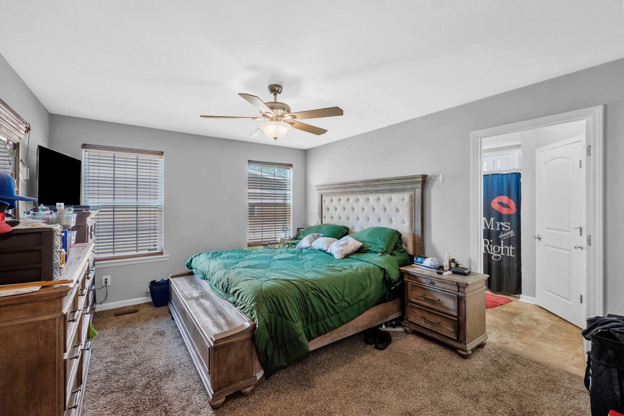 756 Maylene Drive Madison, TN 37115 - Photo 8 of 25 a spacious bedroom with a bed and a flat screen tv
