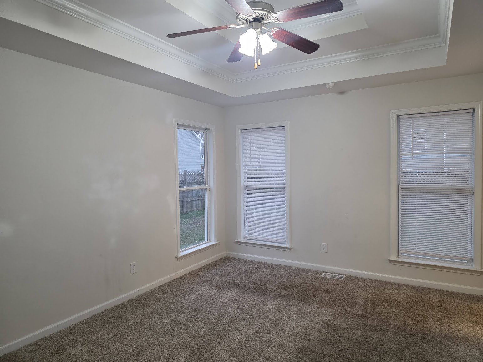 1556 Tylertown Road Clarksville, TN 37040 - Photo 6 of 10 an empty room with closet and a ceiling fan