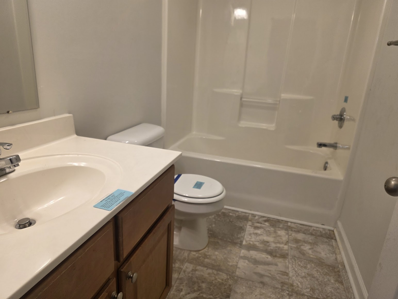 1556 Tylertown Road Clarksville, TN 37040 - Photo 7 of 10 a bathroom with a sink a toilet and shower