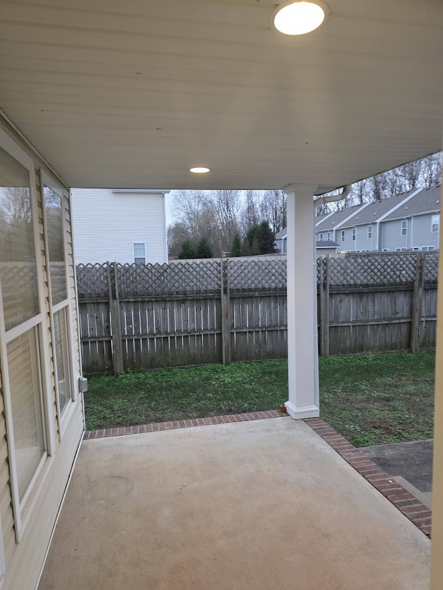 1556 Tylertown Road Clarksville, TN 37040 - Photo 10 of 10 a view of backyard with wooden fence