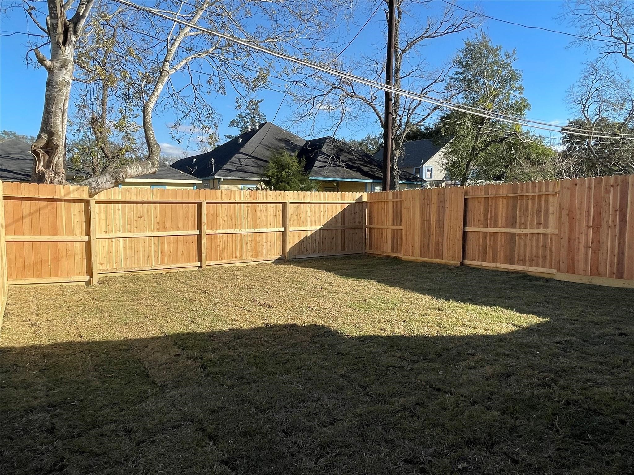 1137 4th Street Rosenberg, TX 77471 - Photo 11 of 16 a view of a backyard