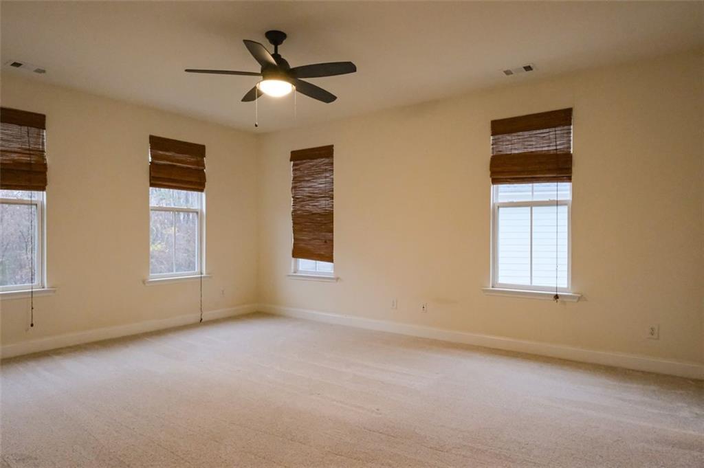 6001 Brookside Oak Circle Norcross, GA 30093 - Photo 21 of 40 a view of an empty room with a window