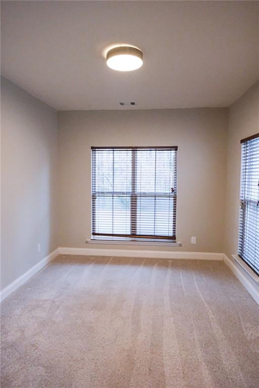 6001 Brookside Oak Circle Norcross, GA 30093 - Photo 28 of 40 wooden floor and window in a room
