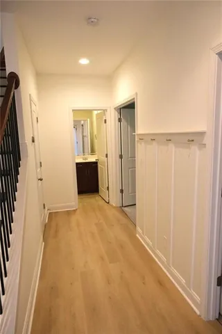 a view of a livingroom with a refrigerator