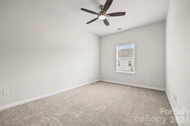 a bathroom with a sink and vanity