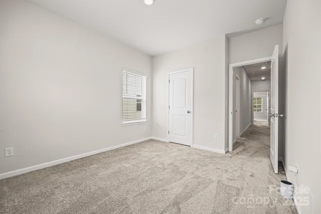 an empty room with a natural light