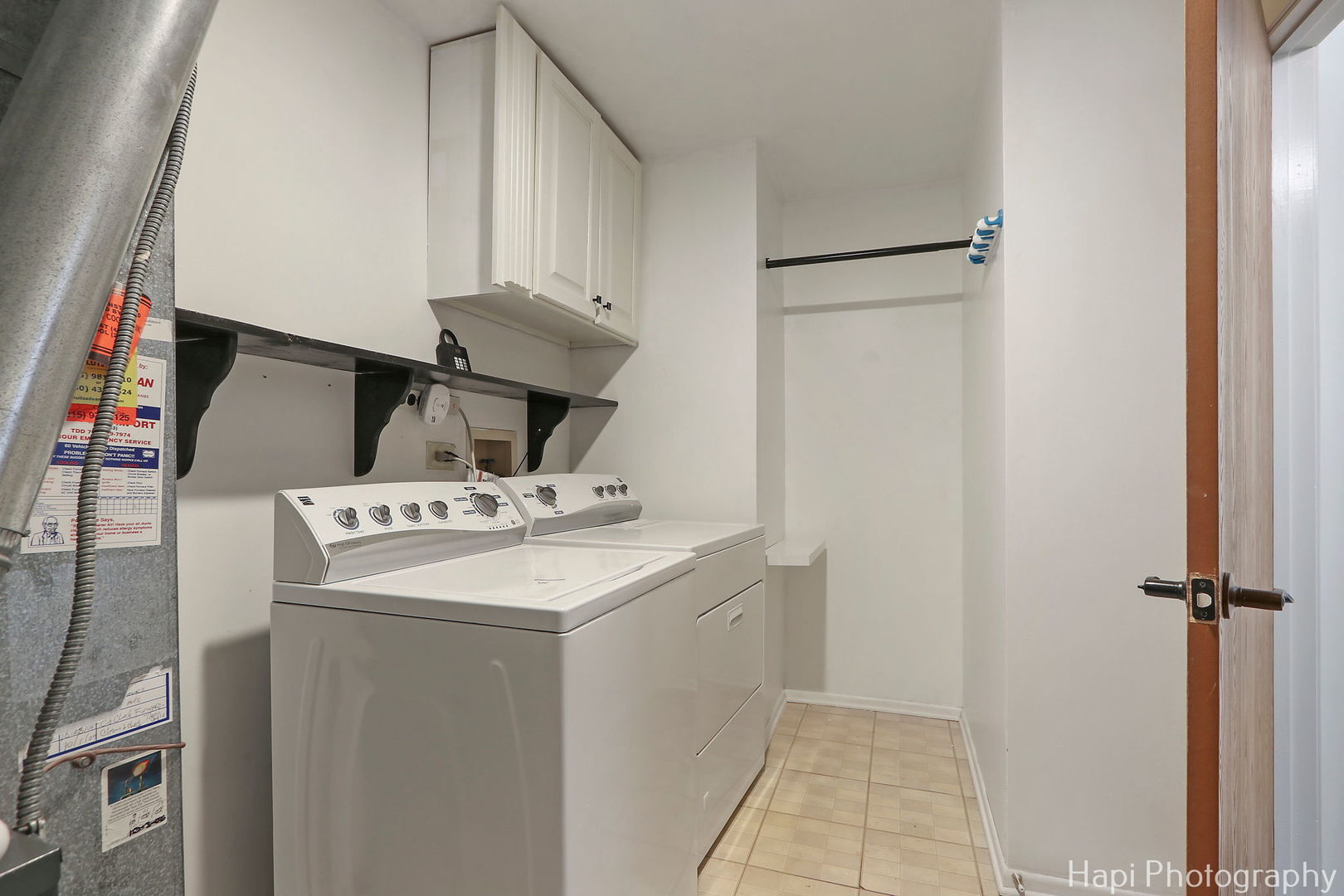 370 Ashford Circle, Unit 2 Bartlett, IL 60103 - Photo 18 of 23 a view of storage and utility room with washer and dryer