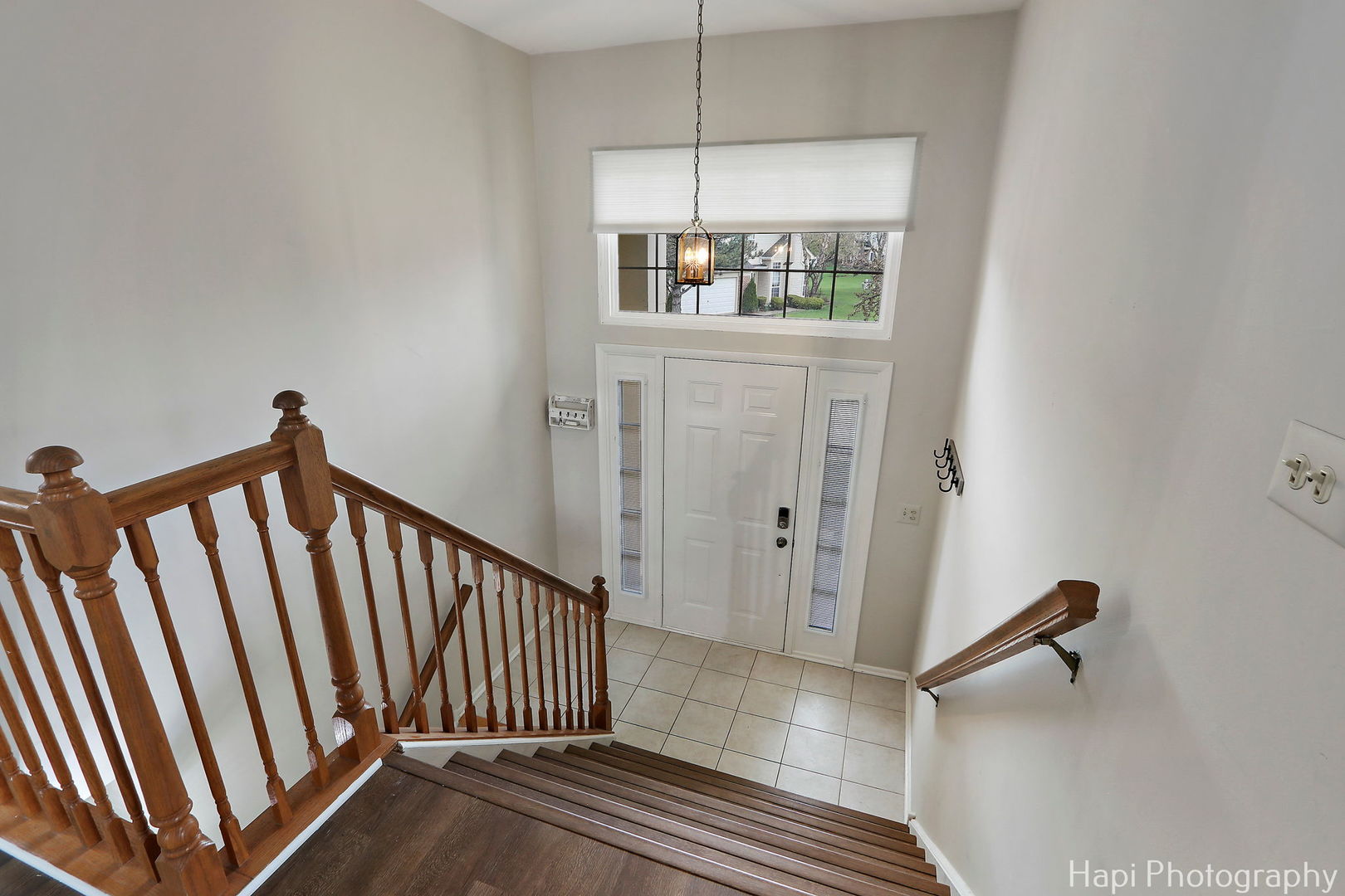 370 Ashford Circle, Unit 2 Bartlett, IL 60103 - Photo 2 of 23 a view of a hallway with windows