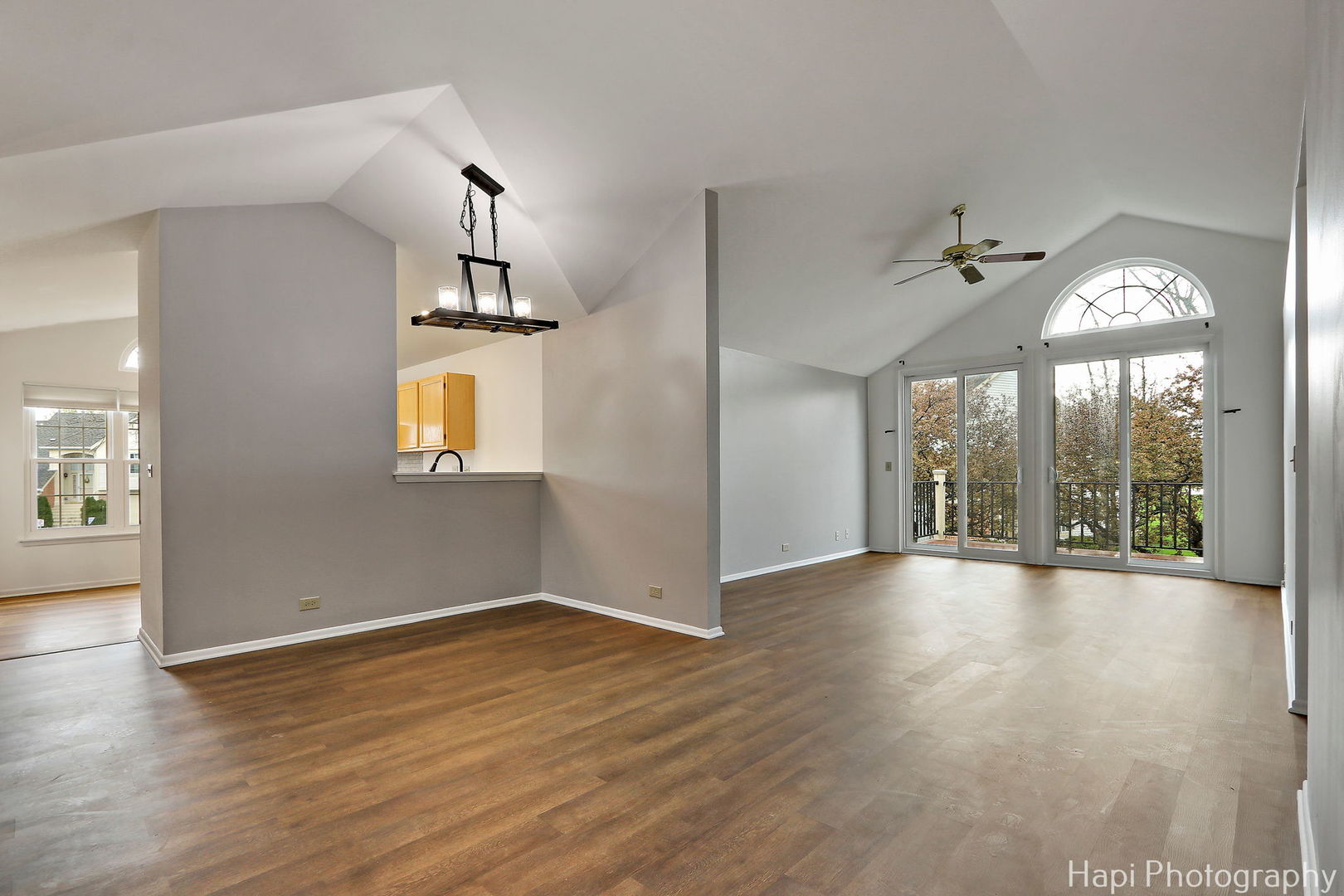 370 Ashford Circle, Unit 2 Bartlett, IL 60103 - Photo 5 of 23 wooden floor in an empty room with a window