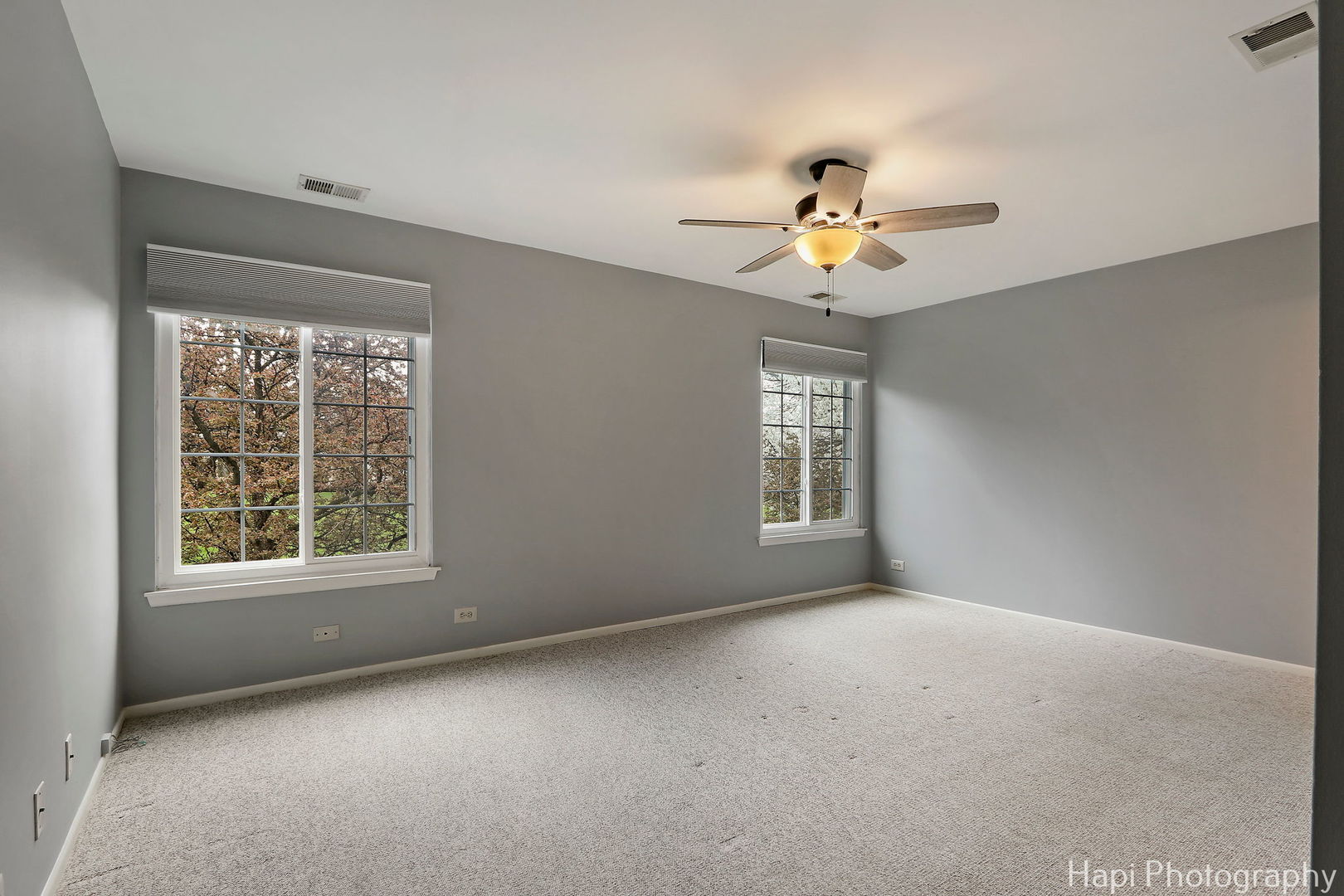 370 Ashford Circle, Unit 2 Bartlett, IL 60103 - Photo 10 of 23 a view of an empty room with a window