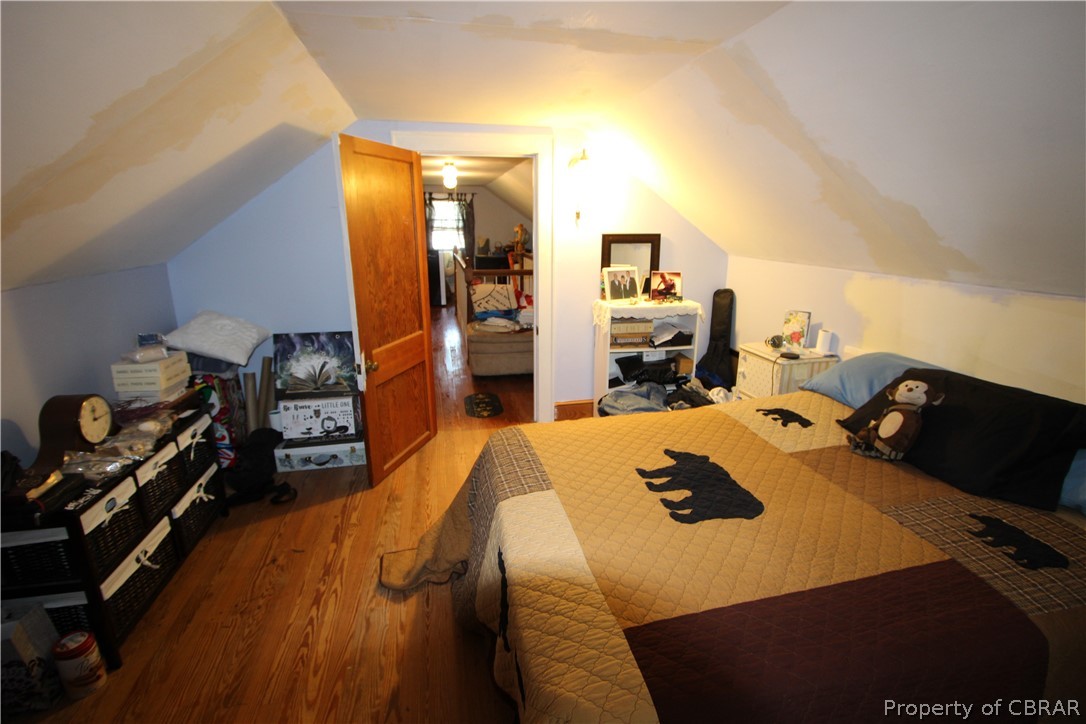 1247 Gdn Crk Road Mathews, VA 23109 - Photo 31 of 49 a bed room with a bed furniture and a tv