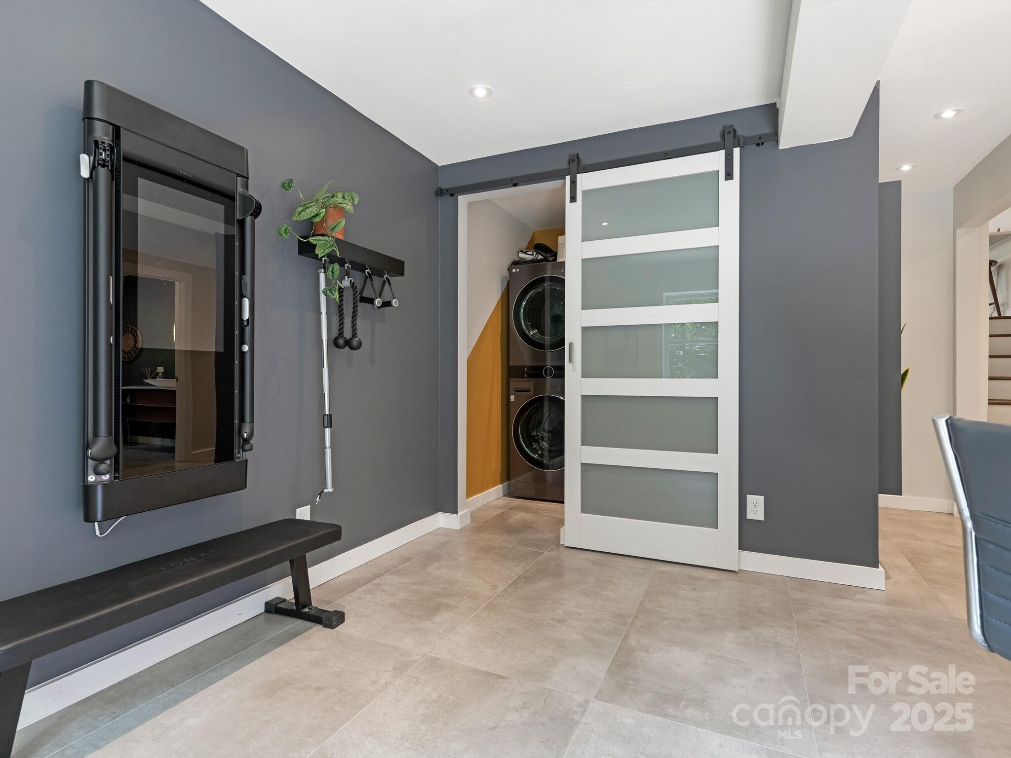 4901 Murrayhill Road Charlotte, NC 28209 - Photo 21 of 28 a view of an empty room with a fireplace and a window
