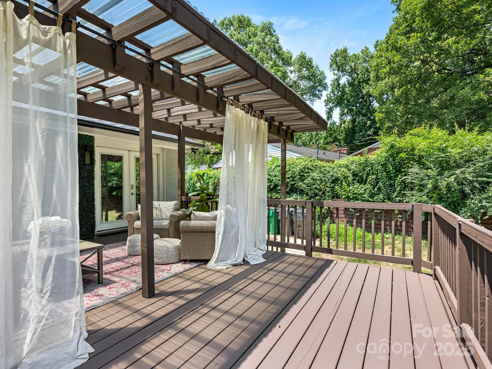 4901 Murrayhill Road Charlotte, NC 28209 - Photo 26 of 28 a balcony with wooden floor