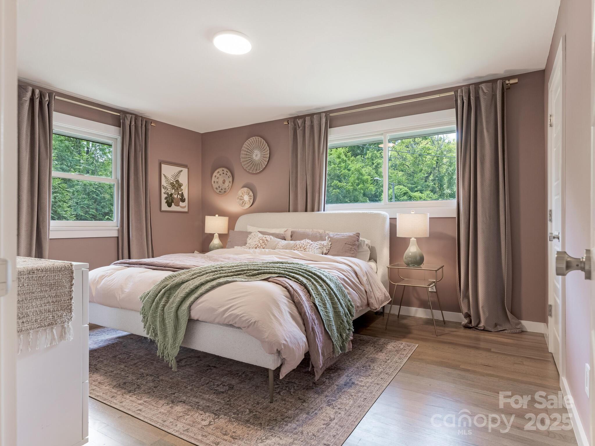 4901 Murrayhill Road Charlotte, NC 28209 - Photo 10 of 28 a bedroom with a large bed and a window