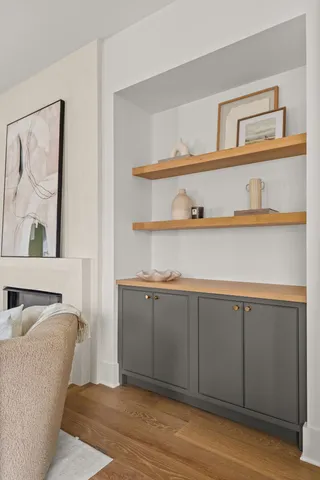 a bed room with a bed and a chair