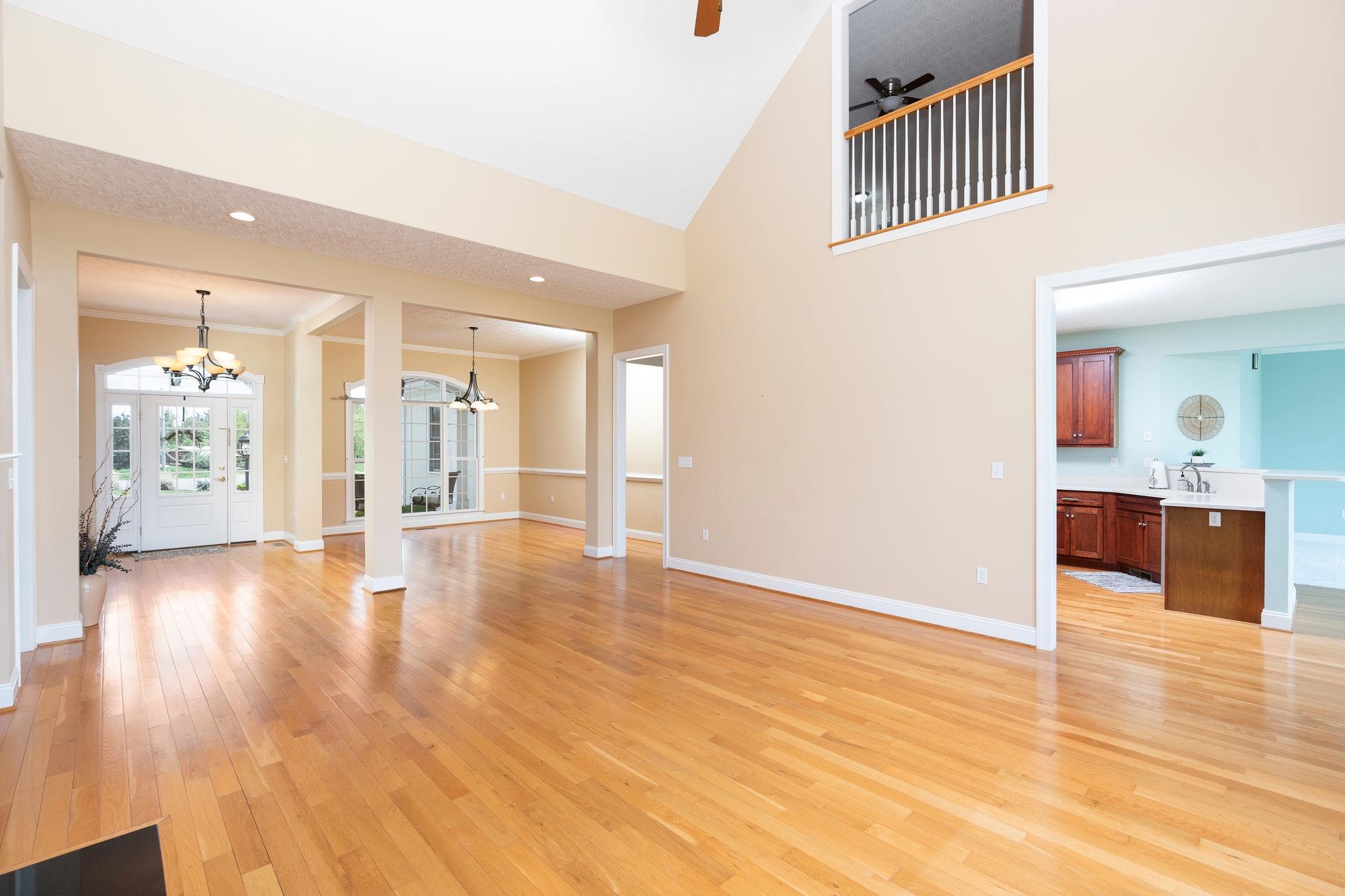 12 Ridgemore Drive Raphine, VA 24472 - Photo 16 of 75 a view of a hallway with wooden floor and a living room