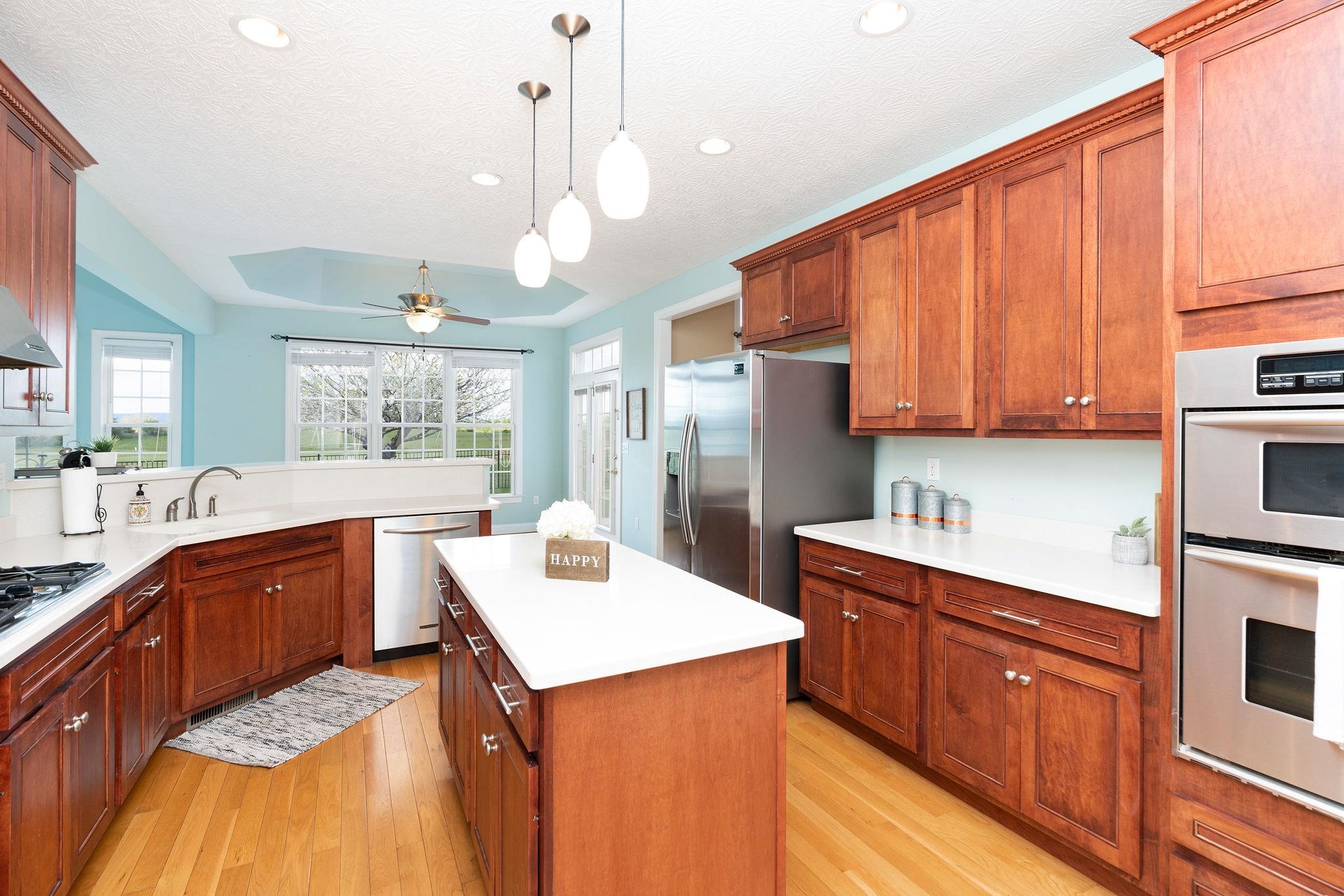 12 Ridgemore Drive Raphine, VA 24472 - Photo 22 of 75 a kitchen with granite countertop a sink a counter space appliances and cabinets