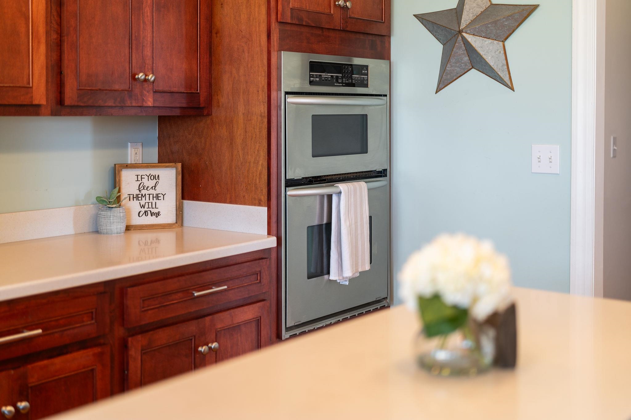 12 Ridgemore Drive Raphine, VA 24472 - Photo 23 of 75 a kitchen with stainless steel appliances granite countertop a stove a microwave and cabinets