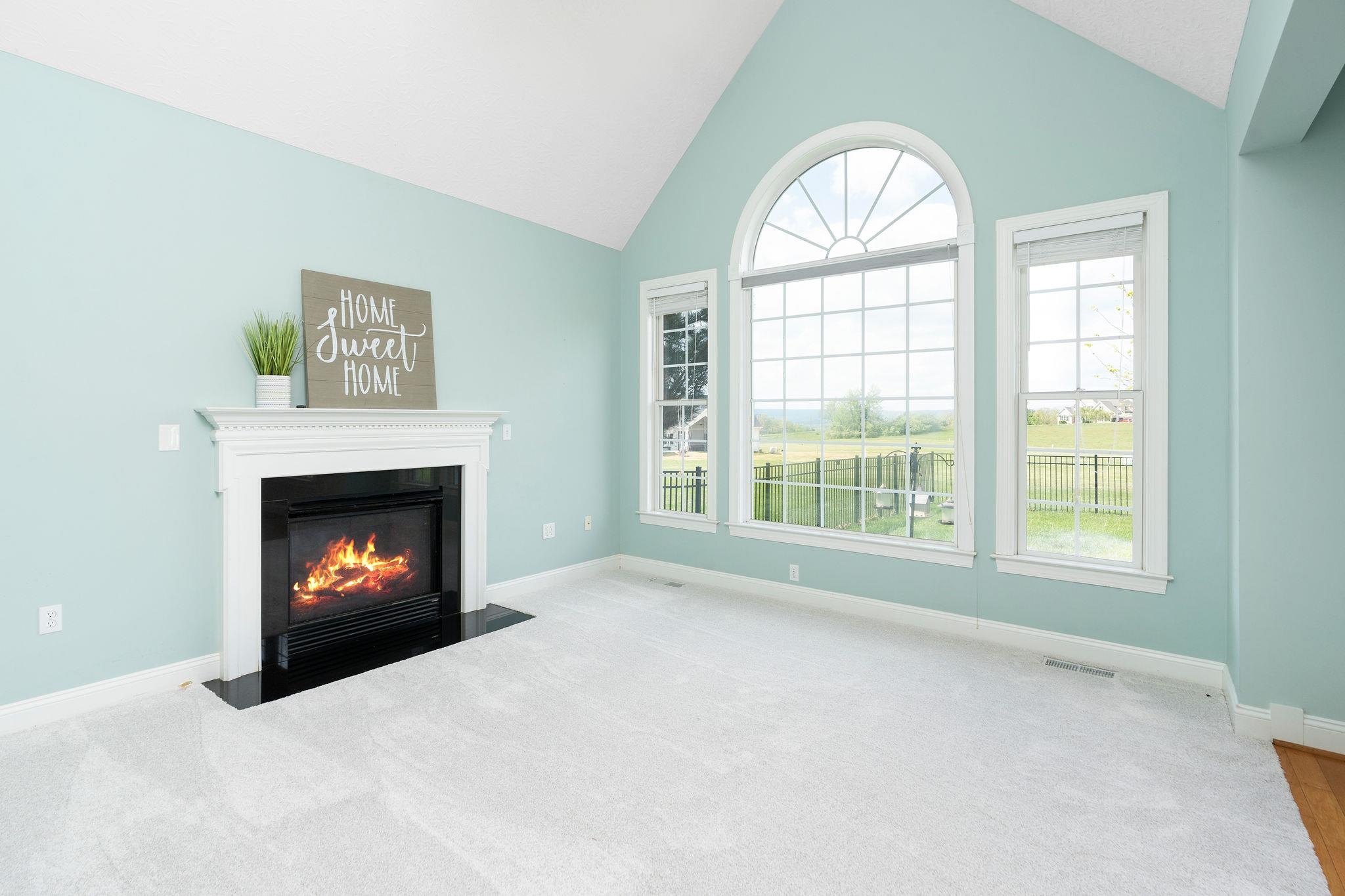 12 Ridgemore Drive Raphine, VA 24472 - Photo 24 of 75 a view of an empty room with a window and fireplace
