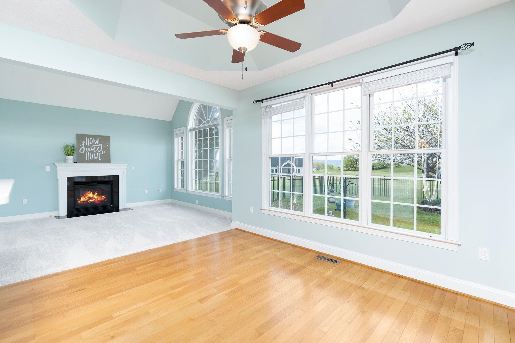 12 Ridgemore Drive Raphine, VA 24472 - Photo 26 of 75 a view of an empty room with a fireplace and a window