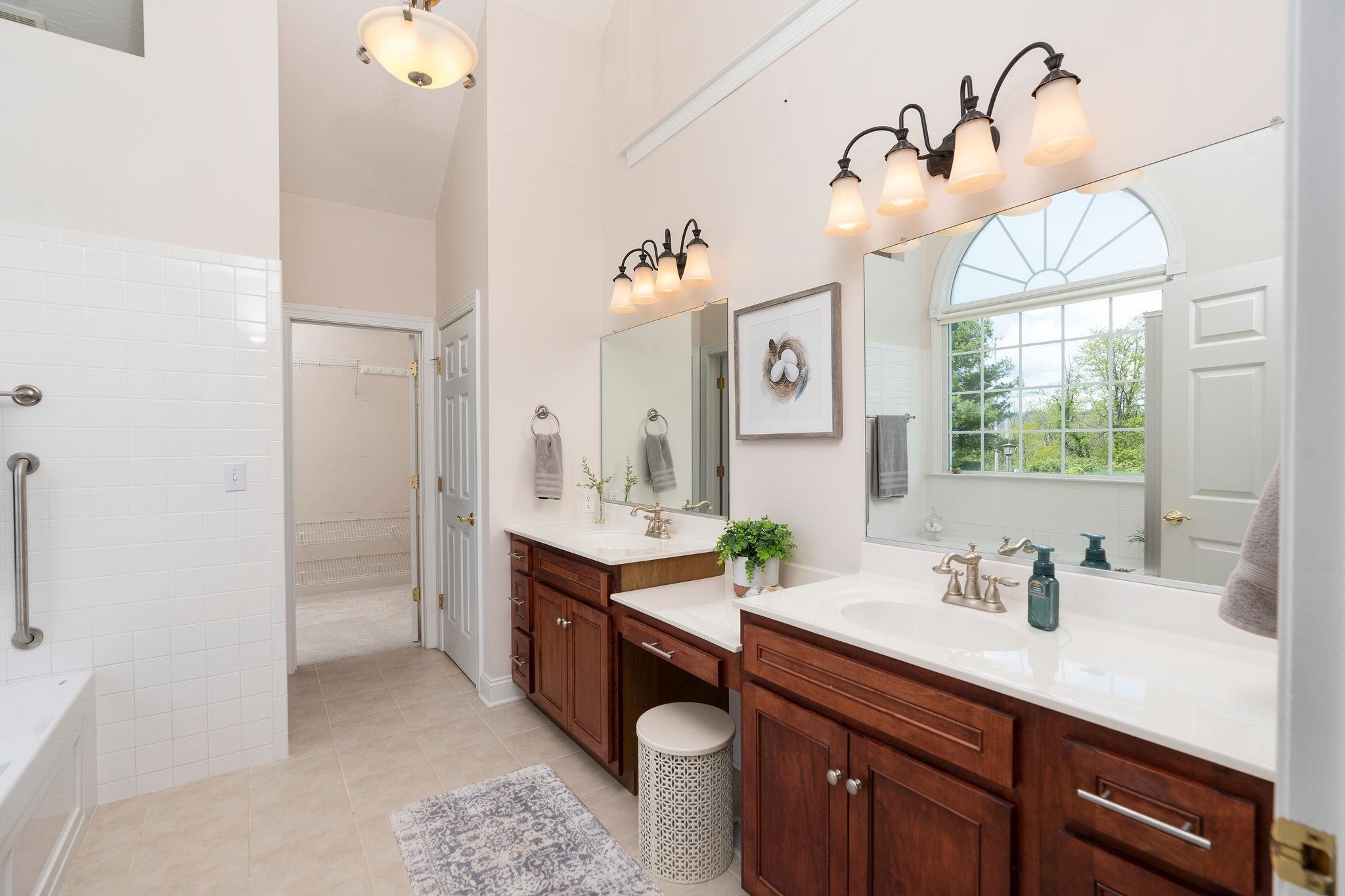 12 Ridgemore Drive Raphine, VA 24472 - Photo 33 of 75 a spacious bathroom with a double vanity sink and a mirror