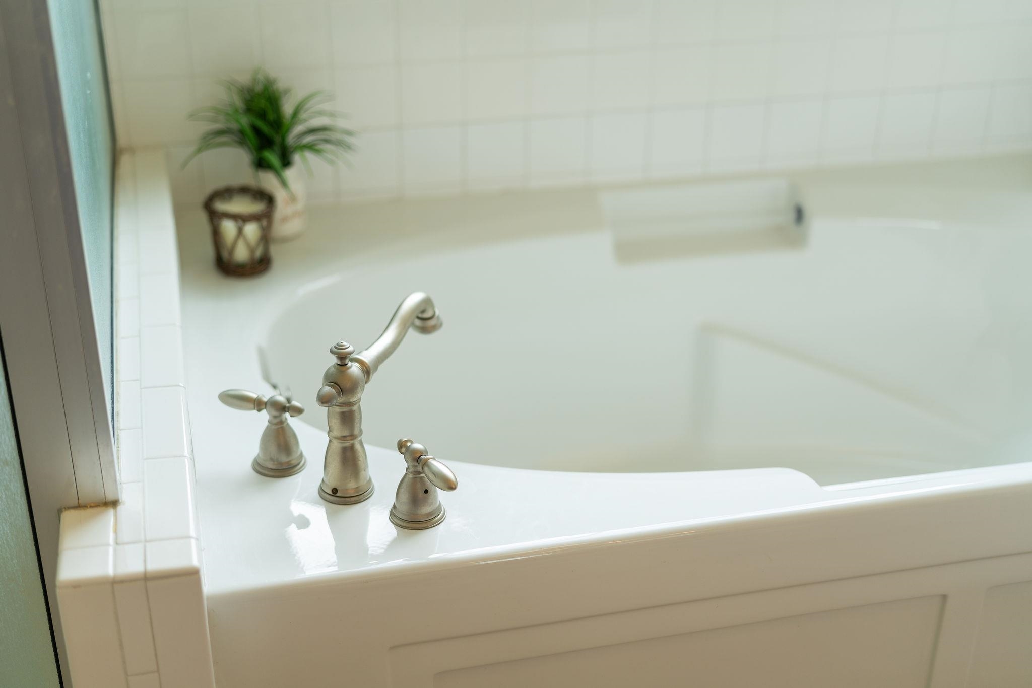 12 Ridgemore Drive Raphine, VA 24472 - Photo 36 of 75 a bathroom with a sink a mirror and a bathtub