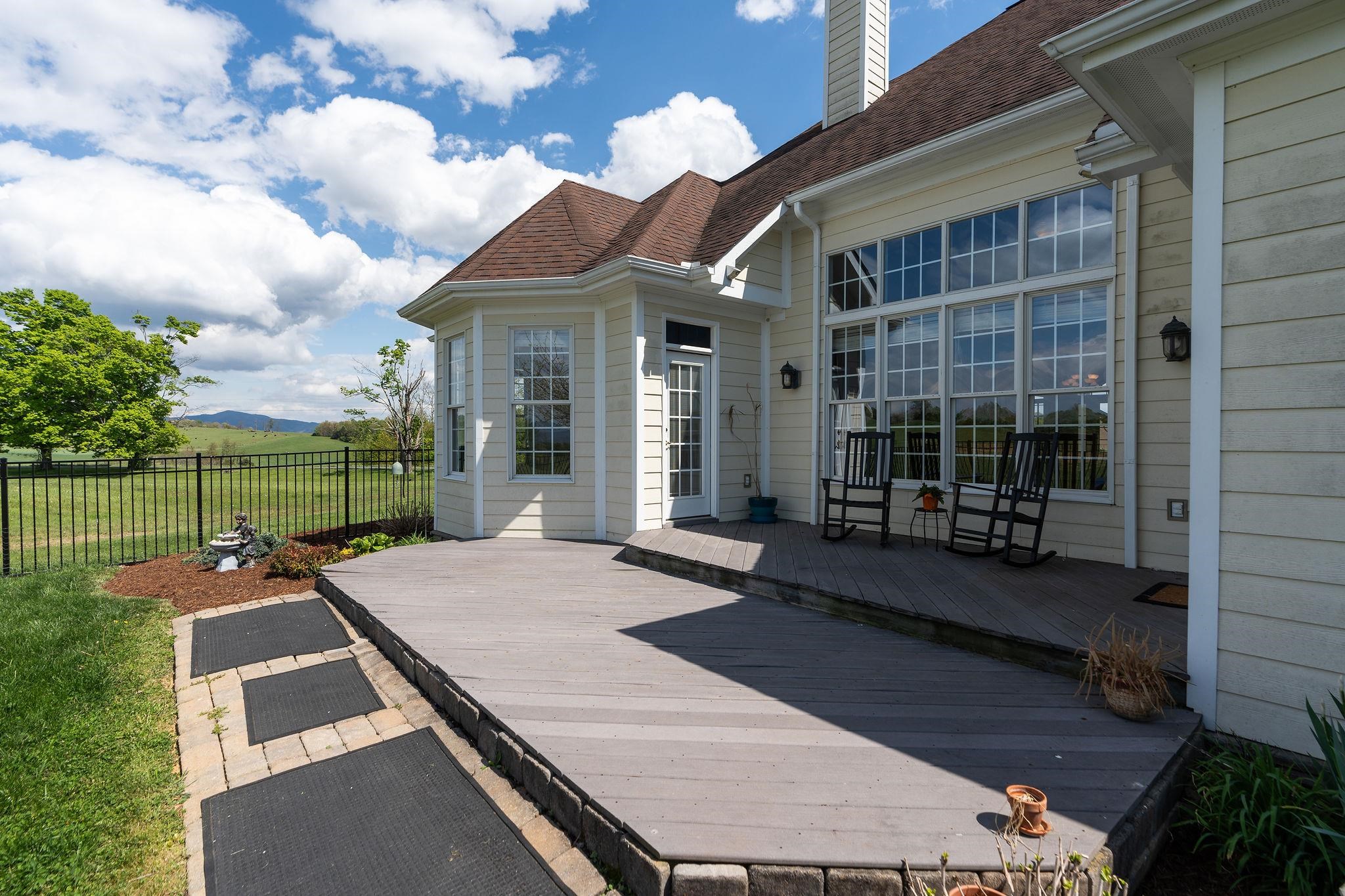 12 Ridgemore Drive Raphine, VA 24472 - Photo 51 of 75 a view of an house with backyard porch and furniture