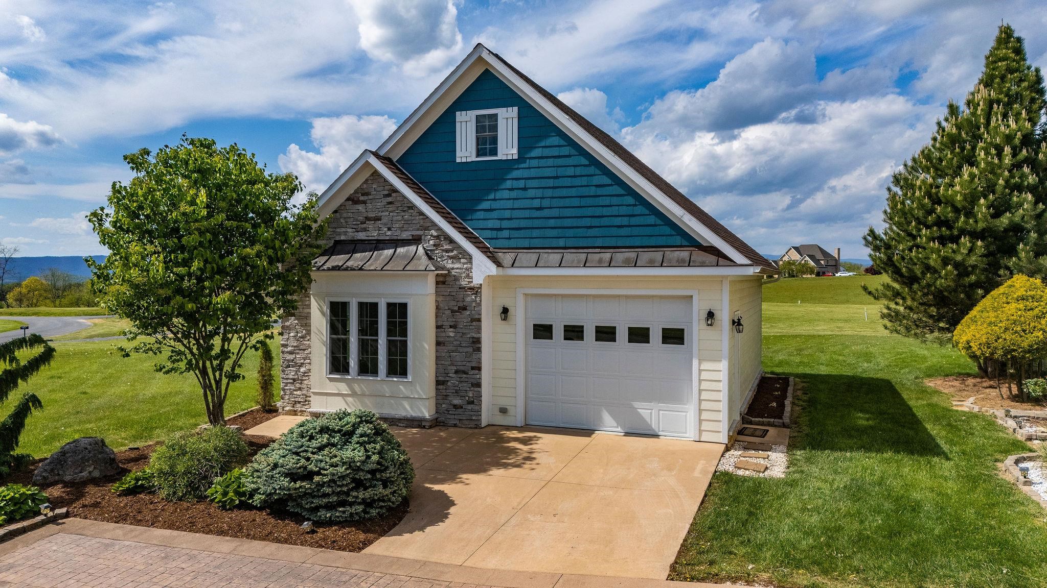 12 Ridgemore Drive Raphine, VA 24472 - Photo 54 of 75 a front view of a house with a garden