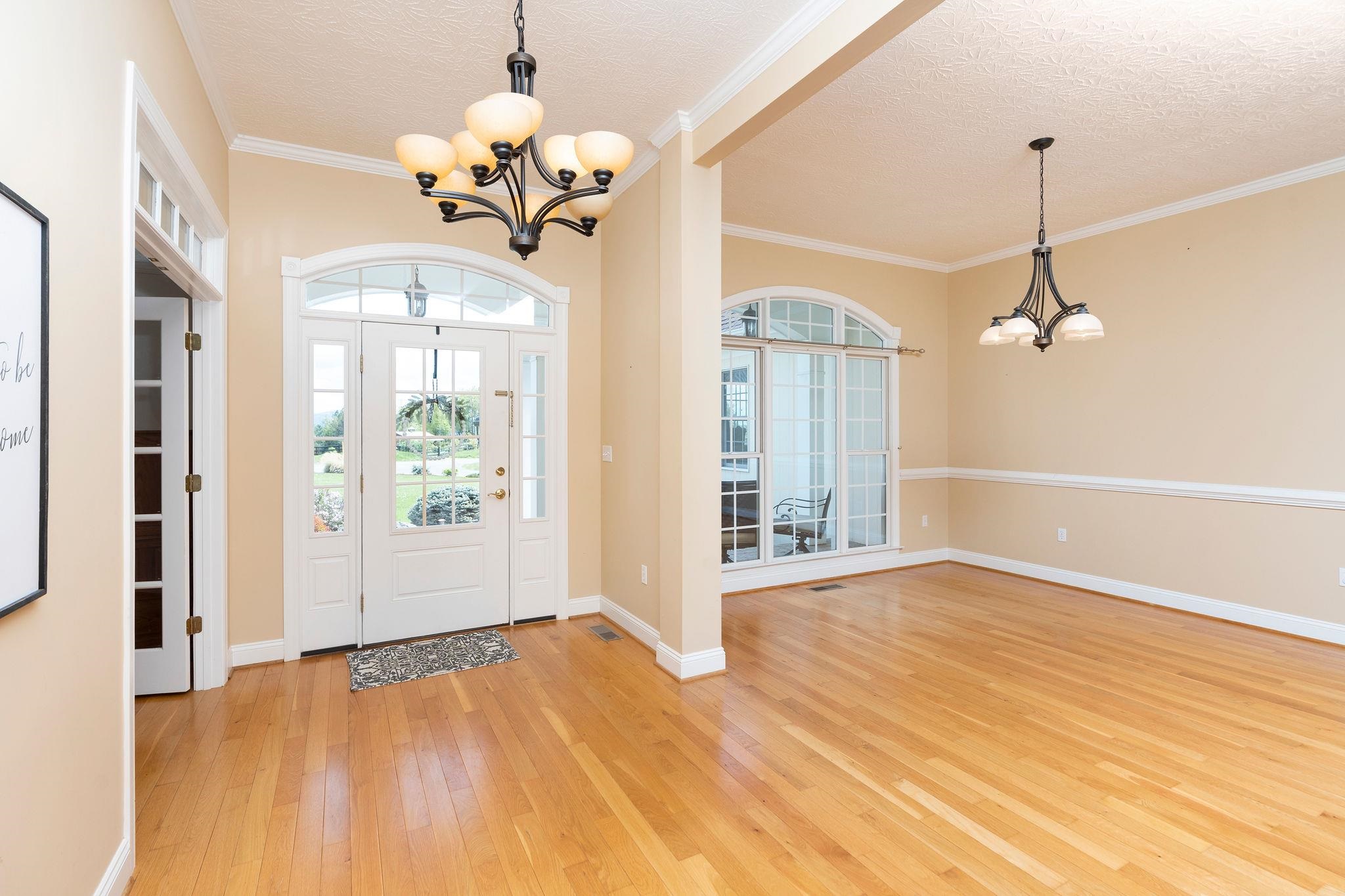 12 Ridgemore Drive Raphine, VA 24472 - Photo 7 of 75 a view of empty room with wooden floor and fan