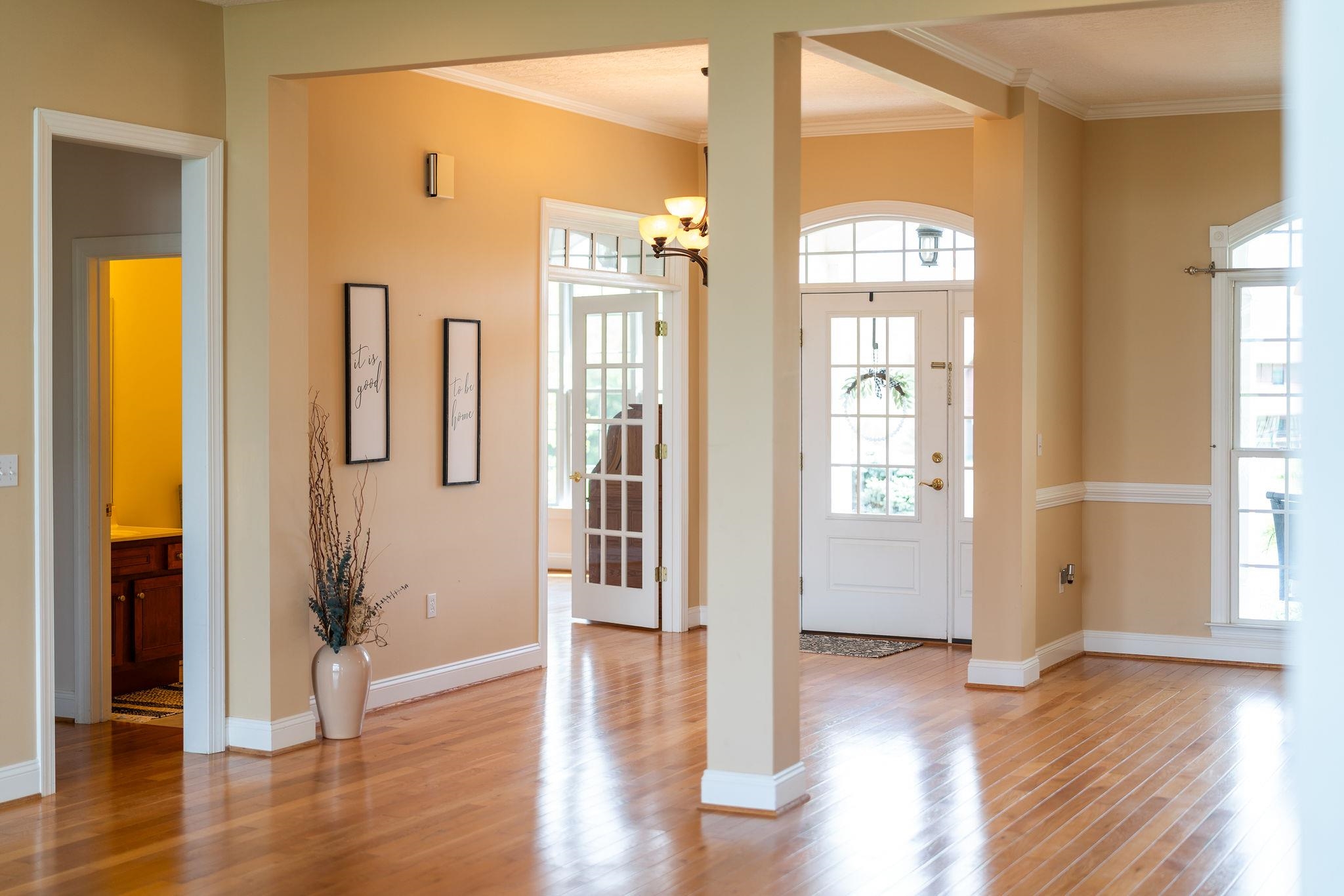 12 Ridgemore Drive Raphine, VA 24472 - Photo 8 of 75 a view of a hallway with wooden floor and windows