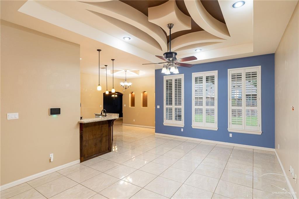 2112 Kilgore Avenue McAllen, TX 78504 - Photo 6 of 19 a view of an empty room with a window