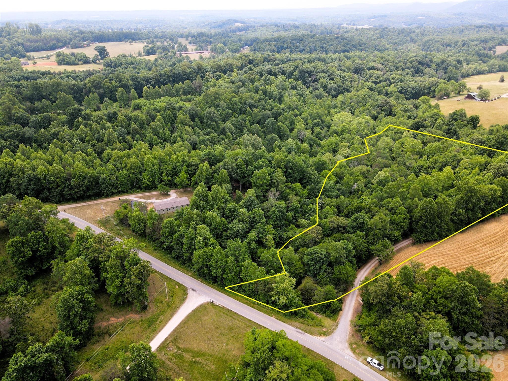 6 Hopewell Church Road, Unit 6 Hiddenite, NC 28636 - Photo 15 of 33 an aerial view of mountain with a yard