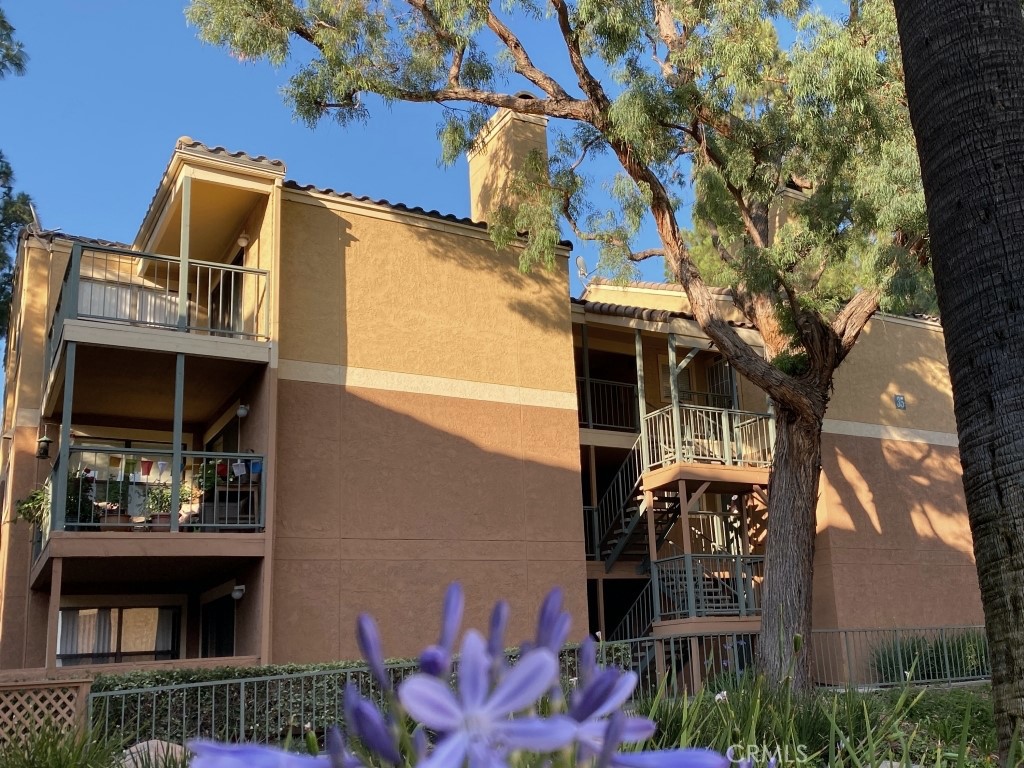 10655 Lemon Avenue, Unit 3509 Rancho Cucamonga, CA 91737 - Photo 1 of 15 front view of a house with a small yard